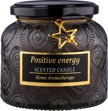 Czarna świeca zapachowa Positive Energy w teksturowanym szklanym słoju ze złotym napisem i gwiazdką, widok z przodu.