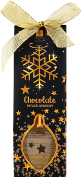 Czarny dyfuzor zapachowy Chocolate w świątecznym pudełku ze złotą wstążką, płatkiem śniegu i oknem-bombką.