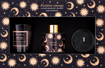 Zestaw Positive Energy: dyfuzor, świeca w czarnym pudełku ze złotymi słońcami i księżycami. Widok z przodu.
