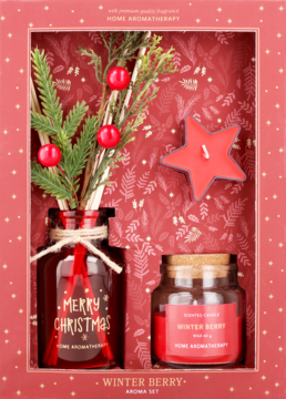 Christmas home aromatherapy set: red diffuser with berries, star candle, and Winter Berry jar candle in gift box.