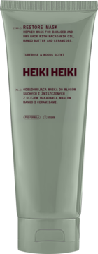 HEIKI HEIKI Restore Mask do włosów suchych, jasnozielona tuba z ciemnym napisem, tuberoza i masło mango, widok z przodu.