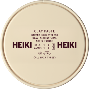 HEIKI Clay Paste, mocno utrwalająca glinka do stylizacji włosów, naturalny mat, okrągły beżowy pojemnik, widok z góry.