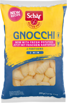 Żółto-niebieskie opakowanie Schär Bezglutenowych Gnocchi ze świeżych ziemniaków, widok z przodu z okienkiem.