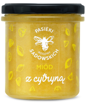 Kremowy miód wielokwiatowy z cytryną Pasieki Rodziny Sadowskich w słoiku, z żółtą etykietą. Widok z przodu.