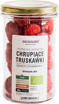 Słoik Biossom z chrupiącymi liofilizowanymi truskawkami 30g, bez cukru. Czerwone owoce, biała etykieta, złota pokrywka.