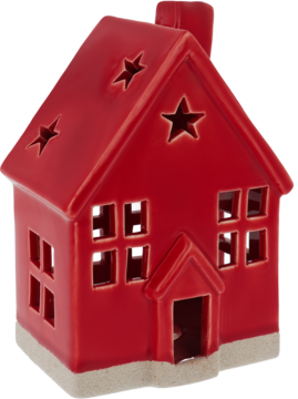 Czerwony ceramiczny domek świecznik z wyciętymi gwiazdkami i oknami, widok z przodu pod kątem.