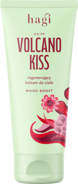 Hagi Volcano Kiss regenerujący balsam do ciała w jasnozielonej tubce, widok z przodu, z czerwonymi napisami i ilustracją kwiatów.