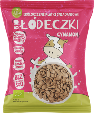 Różowe opakowanie Helpa Bio Łódeczki Cynamon, ekologiczne płatki jaglano-owsiane, z miską płatków.