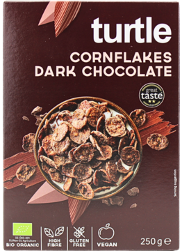 Ciemne pudełko Turtle Cornflakes Dark Chocolate. Wegańskie, bezglutenowe płatki kukurydziane w misce z mlekiem.