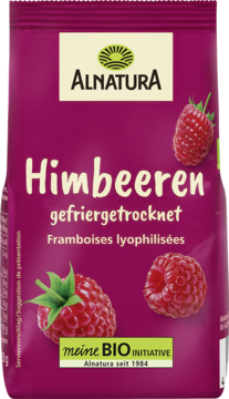 Bordowa torebka Alnatura z liofilizowanymi malinami. Widoczne całe owoce i napisy, logo BIO.