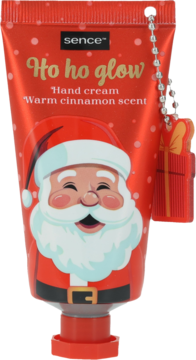Front view of Sence Ho ho glow hand cream, warm cinnamon scent, in a festive red tube with Santa and gift charm.
