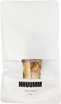 Białe opakowanie Hhuumm Palo Santo, 25 g, z widocznymi drewnianymi patyczkami przez przezroczyste okienko.