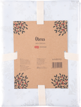 Biały obrus świąteczny w śnieżynki, złożony i zapakowany, z brązową etykietą 140x220 cm ozdobioną jemiołą.