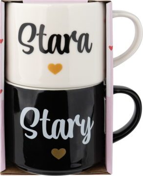 Zestaw dwóch kubków Eloy 350 ml, biały i czarny, z napisami 'Stara' i 'Stary', ułożone w różowym opakowaniu.