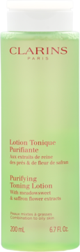 Zielony tonik Clarins Purifying Toning Lotion do cery tłustej, biała zakrętka, napis 200 ml. Widok z przodu.