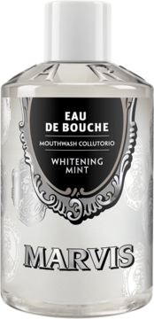 Biała butelka Marvis Whitening Mint, płyn do płukania ust, widok z przodu, z etykietą 'EAU DE BOUCHE'.