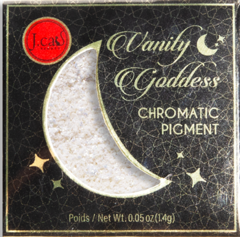 Czarne pudełko J.cat Beauty Vanity Goddess Chromatic Pigment, z białym, lśniącym pyłkiem w kształcie księżyca.