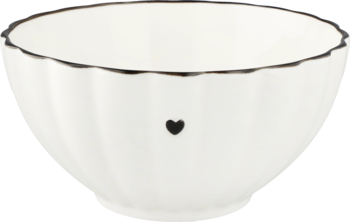 Biała ceramiczna miseczka z czarnym rantem i małym sercem, delikatne żłobienia, widok z góry.