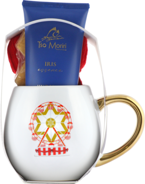 Zestaw Tso Moriri IRIS: niebieska tuba i czerwona myjka w szklanym kubku ze złotym uchem i karuzelą.