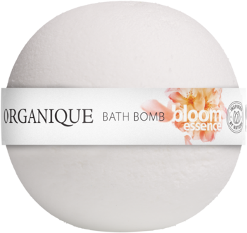 Biała kula do kąpieli Organique Bloom Essence z etykietą, widok z przodu. Naturalne składniki, zapach magnolii.