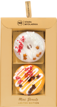 Musujące donuty do kąpieli Stara Mydlarnia w beżowym pudełku, biały i żółty lukier, widok z przodu.