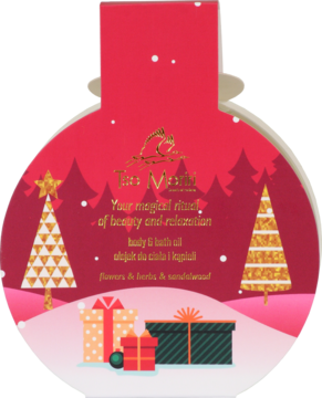 Czerwona, świąteczna etykieta The Vintaj na olejek do kąpieli, z ilustracjami choinek i prezentów.