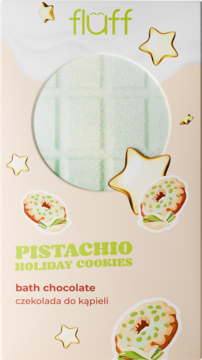 Fluff Pistachio Holiday Cookies bath chocolate w beżowym opakowaniu z zielonym, prążkowanym produktem widocznym.