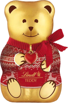 Miś figurka z czekolady mlecznej Lindt Teddy w złotym opakowaniu, czerwony sweterek w zimowe wzory, widok z przodu.