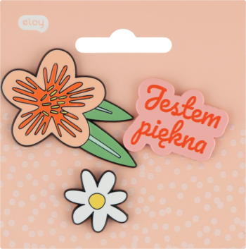 Eloy, zestaw 3 pinów na karcie: duży pomarańczowy kwiat, biała stokrotka, różowy z napisem 'Jestem piękna'.