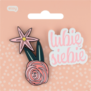 Eloy zestaw 2 pinów: różowe kwiaty z liśćmi i biała z napisem 'lubię siebie', na różowym opakowaniu w kropki.