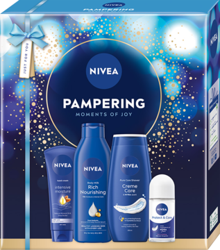 Niebieski zestaw NIVEA PAMPERING z 4 produktami do pielęgnacji ciała, zdobiony błyszczącymi detalami, widok z przodu.