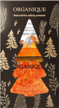 Organique, brązowe pudełko prezentowe ze złotymi choinkami, okno w kształcie choinki z pomarańczowymi drobinkami.