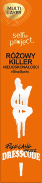 Pomarańczowe opakowanie Selfie Project Różowy Killer Niedoskonałości, z białym, kapiącym symbolem dolara i hasłem #StopSpots.