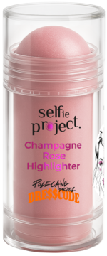 Selfie Project Champagne Rose Highlighter: różowy sztyft z kopułką w przezroczystej tubie, widok z przodu.