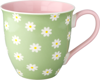 Kubek w kolorze miętowej zieleni z białymi stokrotkami, różowym wnętrzem i uchwytem, widok pod kątem.