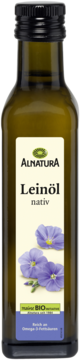 Zielona butelka Alnatura Leinöl nativ, oleju lnianego z Omega-3, z etykietą i niebieskimi kwiatami lnu.