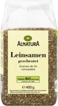 Przezroczysta torebka Alnatura z kruszonym siemieniem lnianym 400g, widok z przodu, brązowe ziarna, zielone logo.