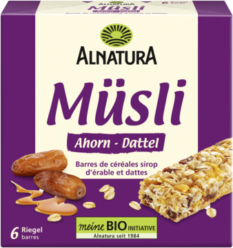 Purple box of Alnatura Muesli Maple-Date bars (6-pack), with a visible bar, dates, and maple syrup.