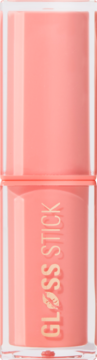 Revolution Pout Lip Gloss Stick Shimmer Peach Sorbet Nude. Pionowe zbliżenie brzoskwiniowego błyszczyka z napisem "GLOSS STICK".