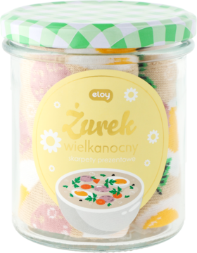 Słoik z zielono-białą zakrętką i etykietą "Żurek wielkanocny skarpety prezentowe", przedstawiającą miskę zup. Widok z przodu.