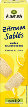 Yellow Alnatura Zitronen Sablés organic shortbread cookie box, with two biscuits, a lemon wedge, and peel.
