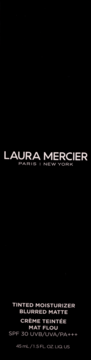 Laura Mercier Tinted Moisturizer Blurred Matte SPF 30. Widok z przodu, czarne opakowanie, biały napis.