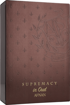 Ciemnobrązowe, tłoczone pudełko perfum Afnan Supremacy In Oud z herbem i fleur-de-lis na froncie.