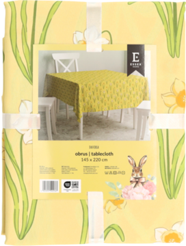 Złożony żółty obrus wielkanocny z wzorem białych żonkili, widok z przodu opakowania.