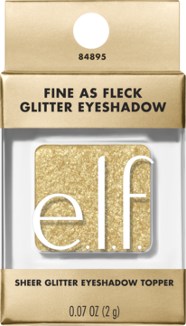 Złoty, brokatowy cień e.l.f. Fine as Fleck w beżowym opakowaniu z przezroczystym okienkiem, widok z przodu.