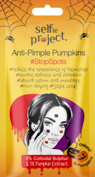 Selfie Project Anti-Pimple Pumpkins for acne, orange pouch with spiderwebs, showing pumpkin patches on a face.