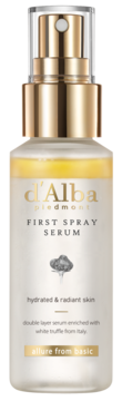 d'Alba First Spray Serum in clear bottle, gold cap, visible two-layer white truffle formula for hydrated skin, front view.