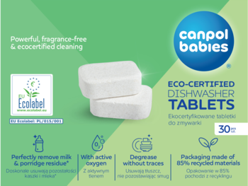 Dwie białe ekologiczne tabletki do zmywarki Canpol Babies na zielonym tle z logo Ecolabel, widok z przodu.