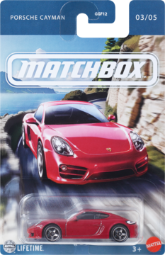 Czerwony Matchbox Porsche Cayman GGF12, model w blistrze na tle drogi, widoczny numer serii 03/05.