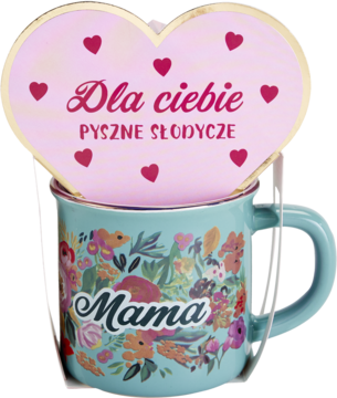 Miętowy kubek emaliowany Mama z kwiatowym wzorem, za nim różowe serce 'Dla ciebie pyszne słodycze'.